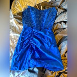 Pretty royal blue home coming dress! Size 10 but fits like an 8-10.